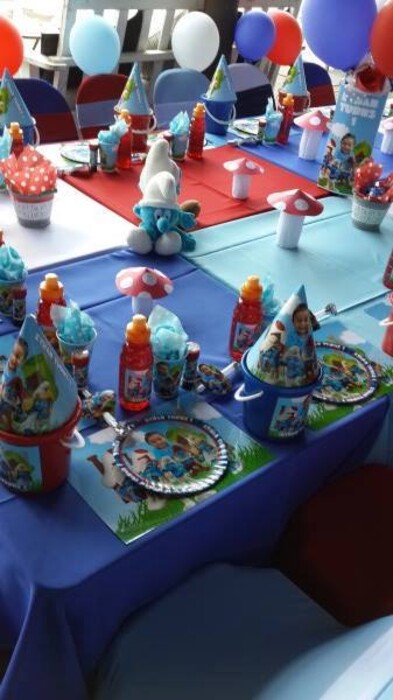 Click on this photo to Zoom. Contact us via email for a complete price list. Our custom made Smurfs party supplies include personalised pvc banners, party packs, movie boxes and more.