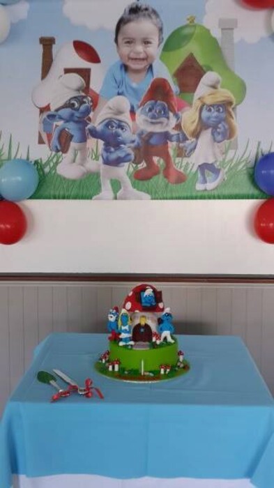 Click on this photo to Zoom. Contact us via email for a complete price list. Our custom made Smurfs party supplies include party hats, printed t-shirts, badges and more.