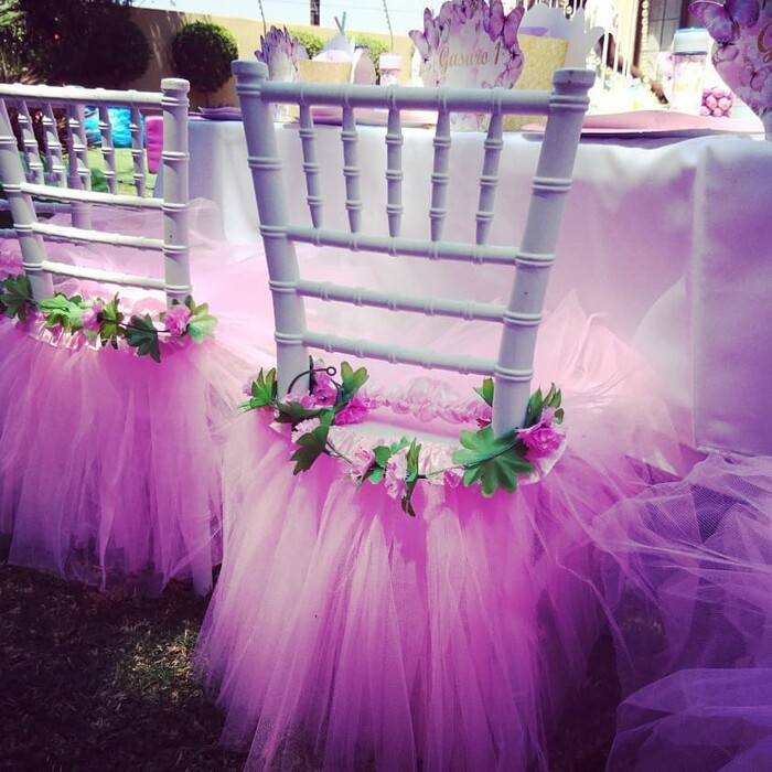 Kiddies tiffany chairs were decorated with tutu skirts and flower headbands. Kiddies tiffany chairs were decorated with tutu skirts and flower headbands.