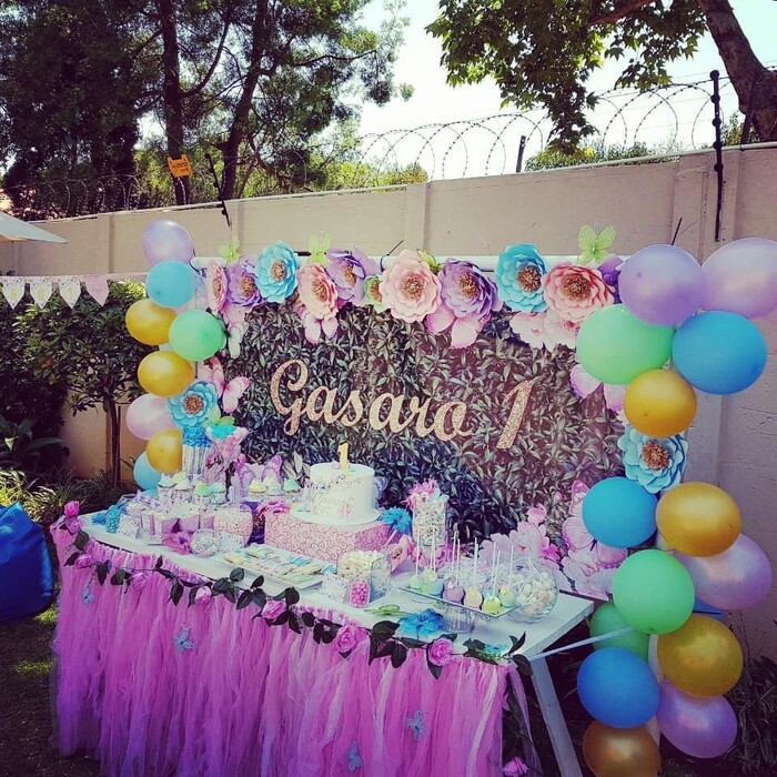 The candy table setup for Gazaro's Floral Butterflies party. The candy table setup for Gazaro's Floral Butterflies party.
