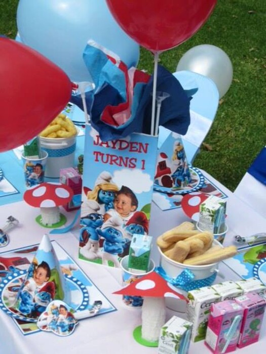 Click on this photo to Zoom. Contact us via email for a complete price list. Kiddies Theme Parties hire out gazebos, picnic tables, umbrellas and photo boards for your Smurfs party.